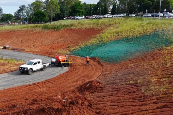 5 Key Considerations When Starting a Hydroseeding Business 59 Aerial view of an operator starting a Hydroseeding Business by spraying land with a Vortec hydroseeder